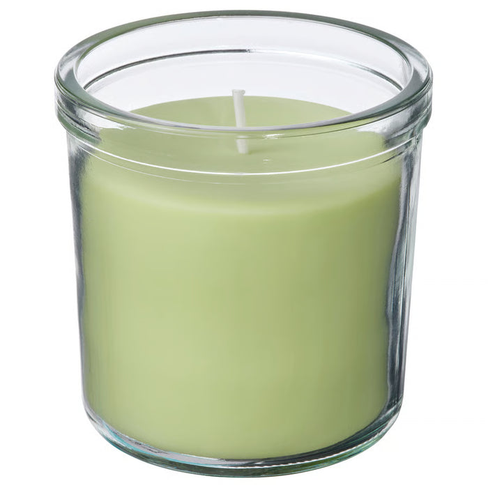 IKEA LÖVSKOGSLUND green apple scented candle in cylindrical clear glass jar with white wick