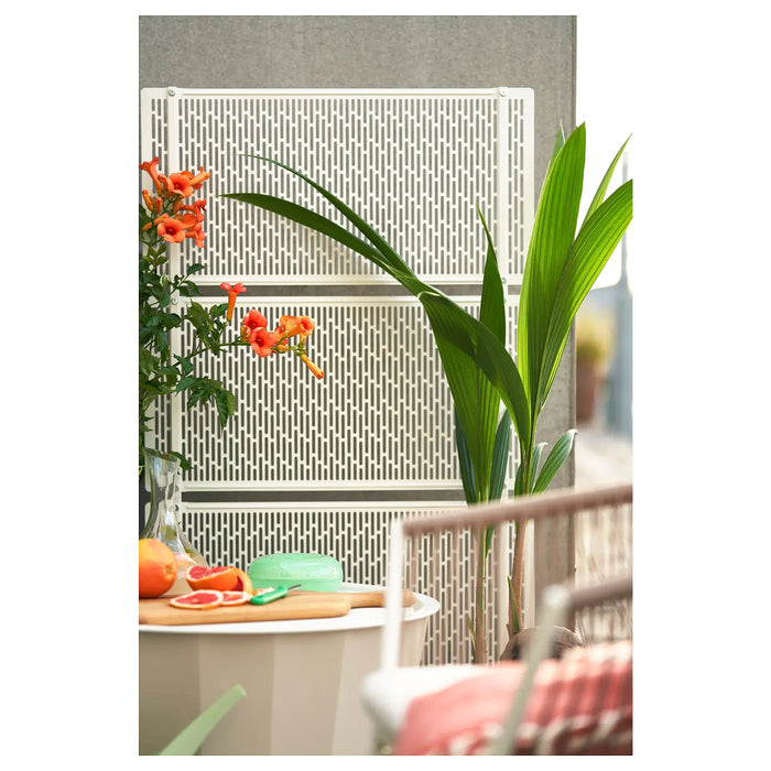 IKEA LUNGÖN off-white outdoor privacy screen with climbing plants on garden patio