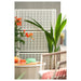 IKEA LUNGÖN off-white outdoor privacy screen with climbing plants on garden patio