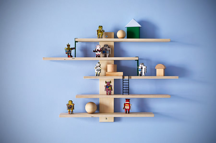 : IKEA LUSTIGT wall shelf styled with toys in a children's room, house-shaped wooden display unit
