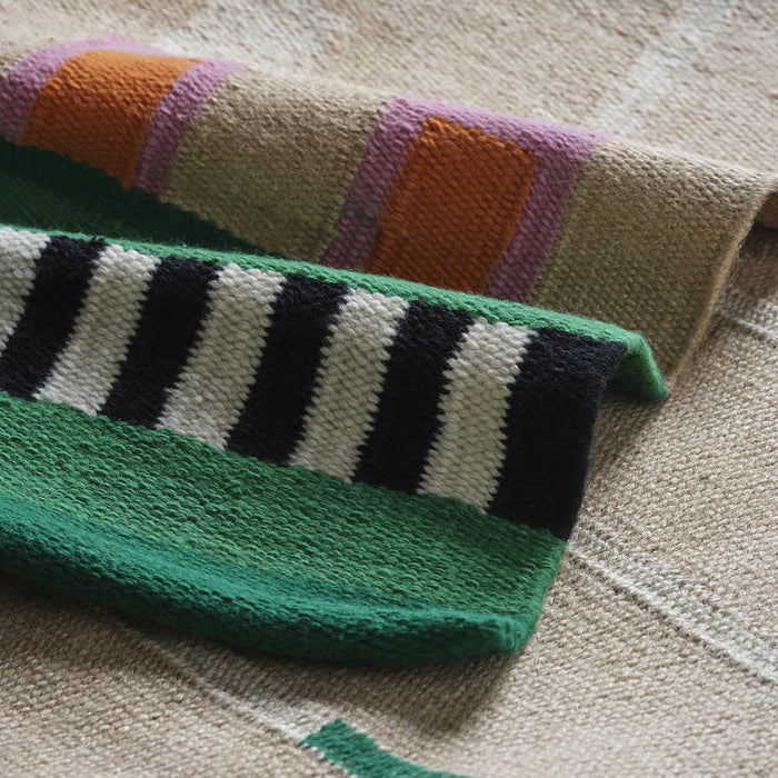 IKEA MÄVINN jute rug close-up texture green black white multicoloured wool stripes