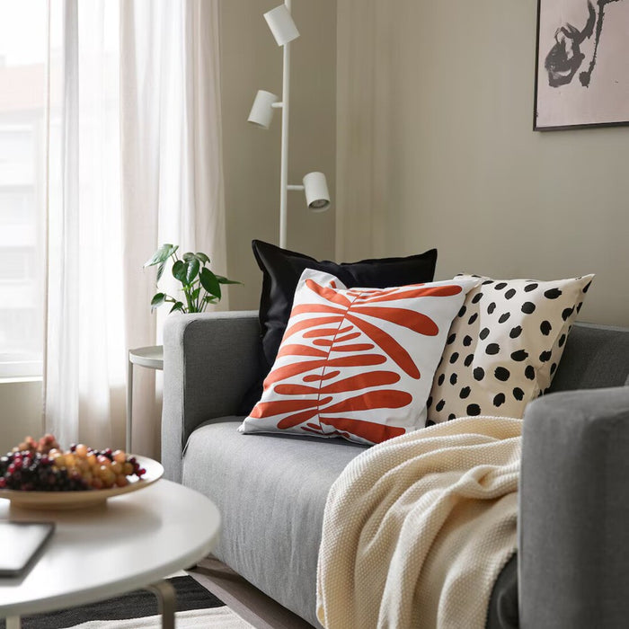 Decorative IKEA MAJSMOTT Cushion Cover featuring an off-white and red pattern, 50x50 cm 70563440