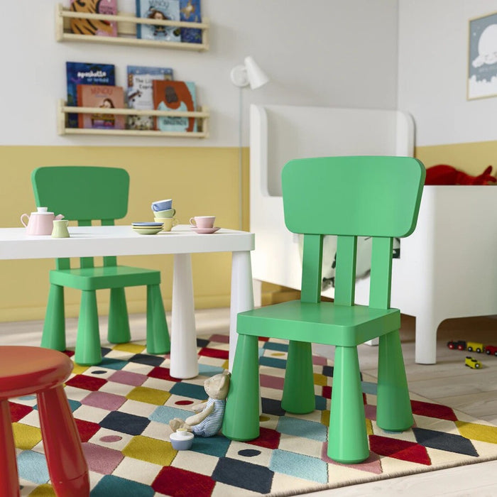 IKEA MAMMUT children's chair, sturdy and green, suitable for both indoor and outdoor settings