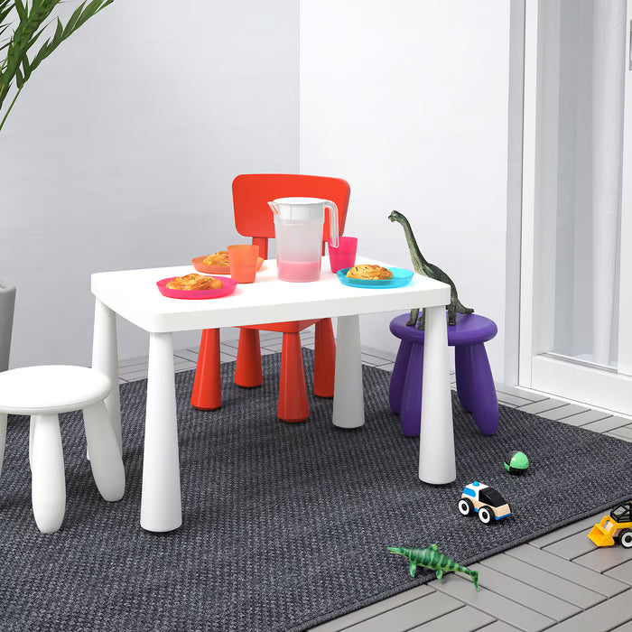IKEA MAMMUT white stool at kids activity table with small chairs and play items colourful setting