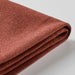 Close-up of IKEA MÅRENÄS red-brown chair cover fabric texture and stitching