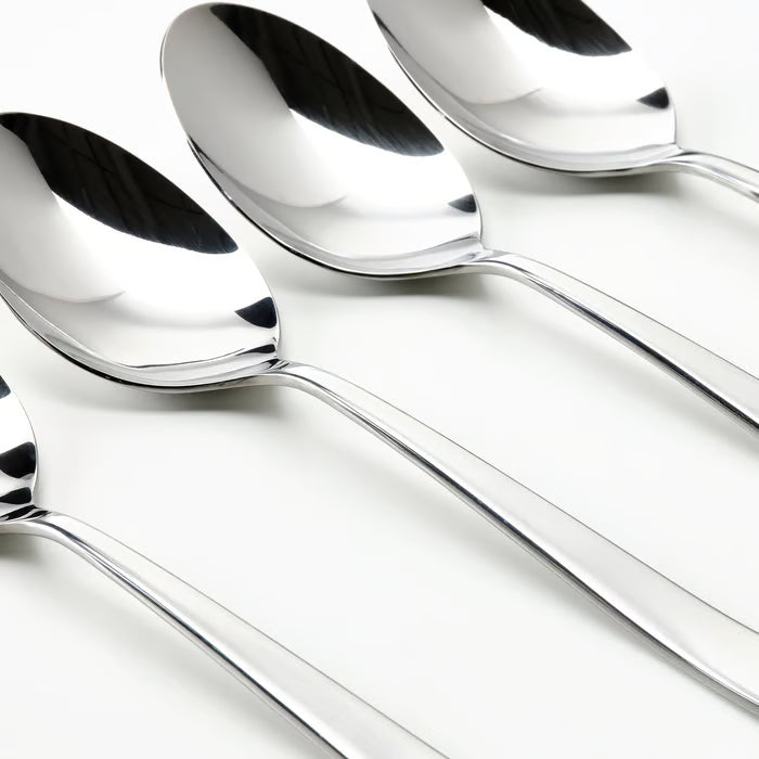 IKEA MARTORP stainless steel spoons arranged on white surface top view clean modern cutlery