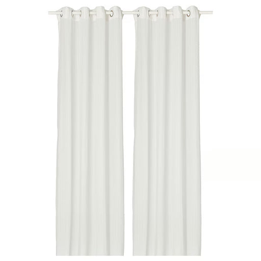 IKEA MATILDA white sheer curtains close-up showing eyelet top and fabric texture