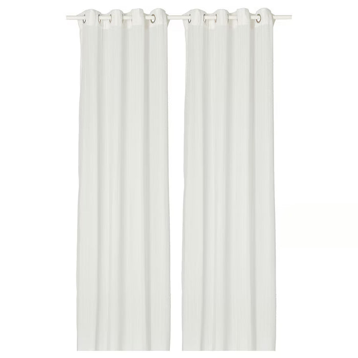 IKEA MATILDA white sheer curtains close-up showing eyelet top and fabric texture