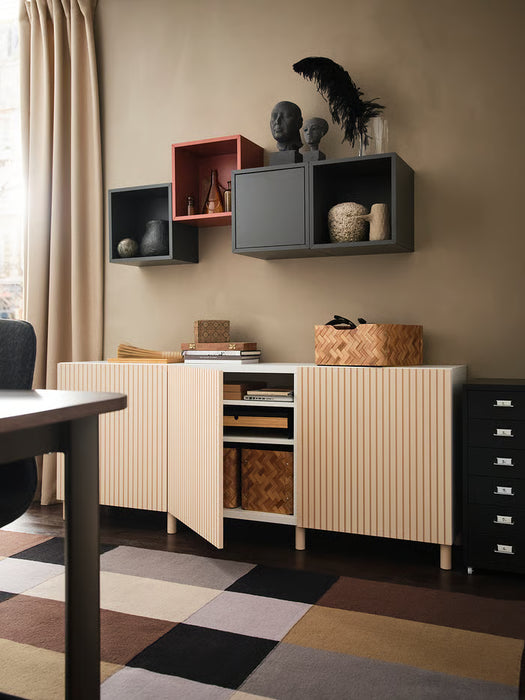 IKEA MEJARP birch legs under a light wood BESTÅ cabinet in a modern living room with geometric rug