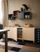 IKEA MEJARP birch legs under a light wood BESTÅ cabinet in a modern living room with geometric rug
