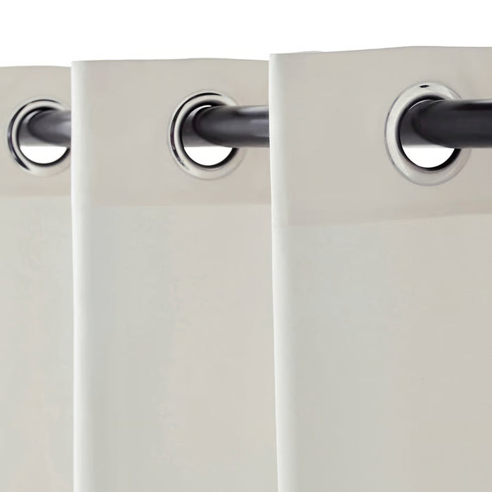 IKEA MERETE white curtains with eyelet heading on curtain rod, light-blocking and privacy view