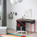 IKEA MICKE anthracite red desk in modern home study setup with red chair and pegboard wall organiser