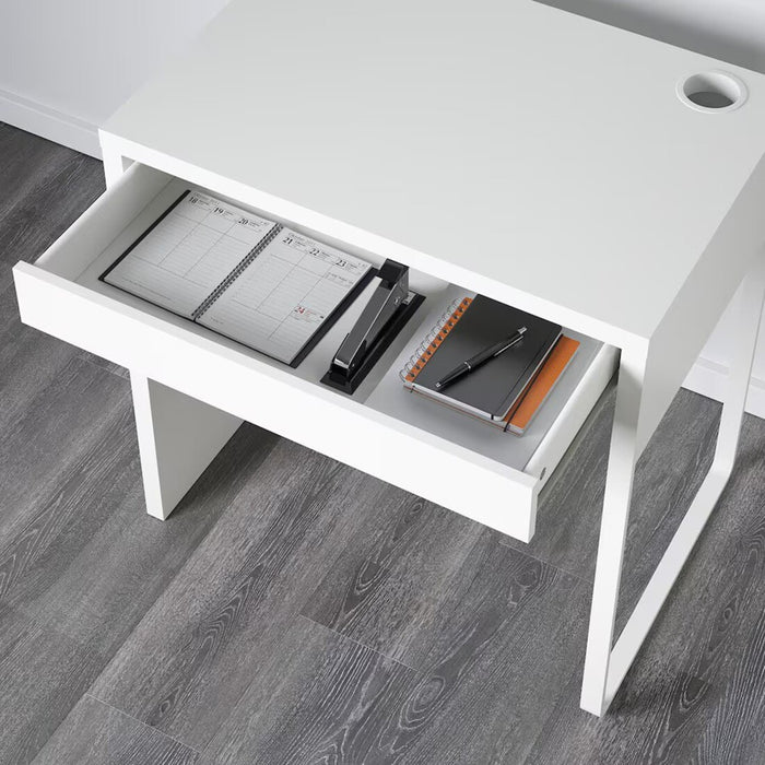 MICKE white desk from IKEA, 73x50 cm, providing a compact workspace solution 80354281