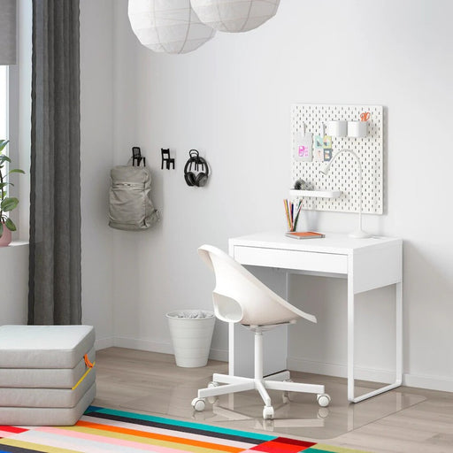 White IKEA MICKE desk, 73x50 cm, placed in a bright, minimalistic room 80354281