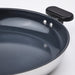 Close-up of IKEA MIDDAGSMAT pan non-stick interior surface and sturdy handle