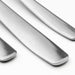 IKEA MOPSIG 12-piece cutlery set three polished stainless steel pieces close-up reflective finish