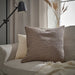 Textured cotton MOROTSMÖTT pillow cover in neutral grey-beige and dark anthracite, machine-washable (50x50 cm).70571100