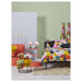 IKEA MURREVA duvet cover styled on a bed in a bright bedroom with coordinating cushions