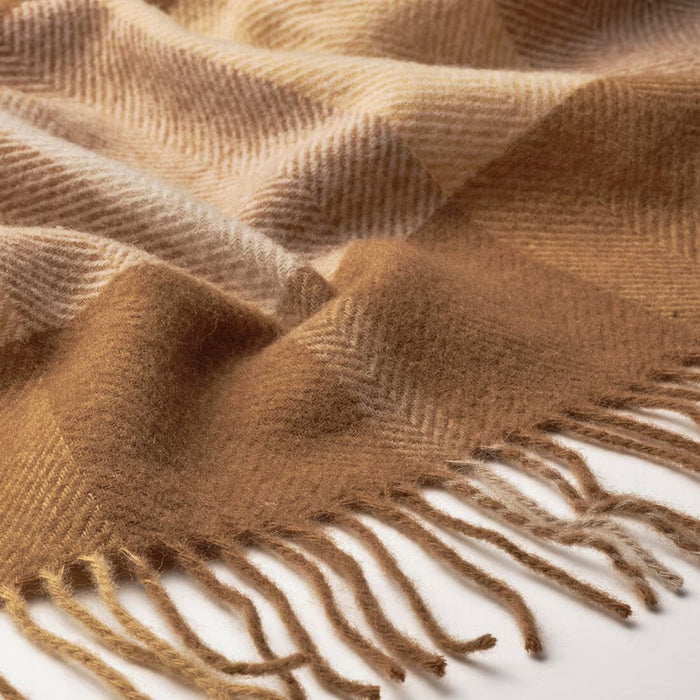 Close-up of soft MYRULL throw, light brown color, 130x170 cm, folded neatly
20563485