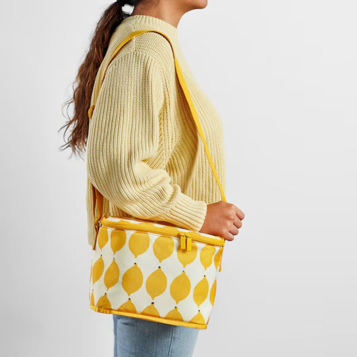 Stylish IKEA NÄBBFISK Cooling Bag in white and yellow pattern, 26x19x19 cm. Perfect for picnics, outings, and keeping items cool on the go