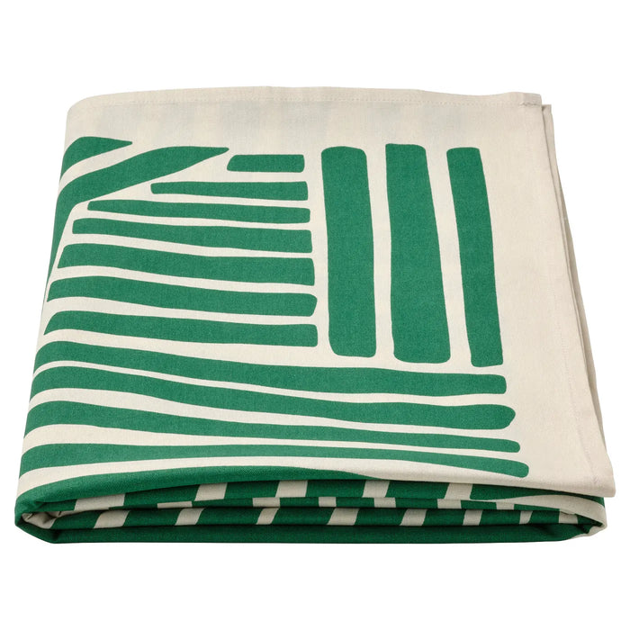  IKEA NÄBBFISK green patterned cotton tablecloth styled with plates and cutlery on dining table