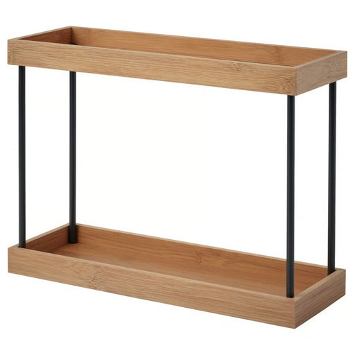 IKEA NÅLBLECKA kitchen countertop organiser with two tiers, made of natural bamboo trays and black metal posts, on a white background-90564617