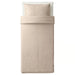 IKEA NATTJASMIN light beige duvet cover and pillowcase set laid flat showing full dimensions