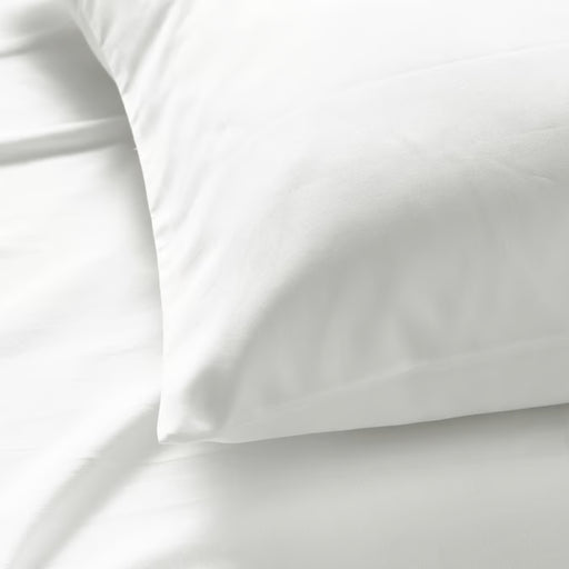 Close-up of IKEA NATTJASMIN white pillowcase fabric showing silky cotton-lyocell sateen texture