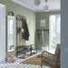  IKEA NIPÅSEN black shoe bench in lime-green hallway styled with coat rack hooks jackets and baskets