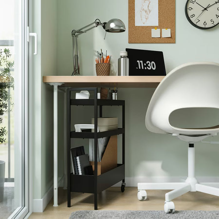 IKEA NISSAFORS black rolling trolley used as bathroom organiser in small space