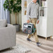Child carrying IKEA ÖVNING organiser with tablet and study supplies at home