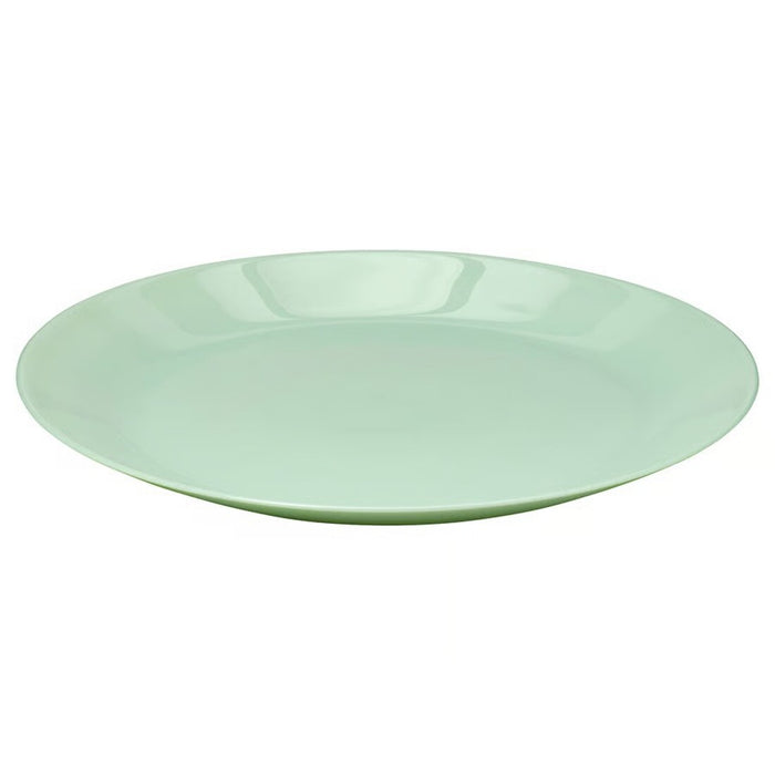 A round, light green ceramic plate with a glossy finish and a smooth surface, ideal for serving meals or snacks."