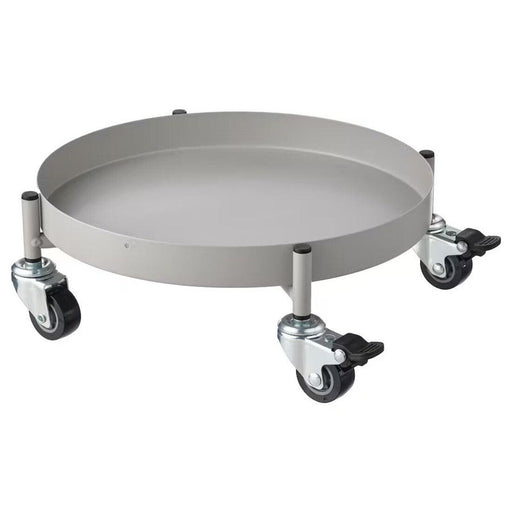 A light grey IKEA OLIVBLAD plant mover with a 32 cm diameter, designed for easy movement of indoor and outdoor plants. 30561315
