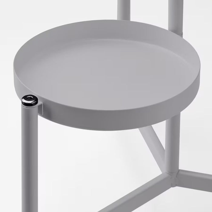  close-up image of the IKEA OLIVBLAD Plant Stand in light gray, 58 cm. It highlights the sleek, modern design of the stand