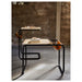 OLSERÖD side table with mustard fabric pouch beside black metal frame on wood surface