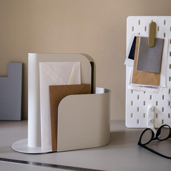 IKEA FAGNING magazine file, light grey-beige, displayed on a desk with neatly organized files
00554137