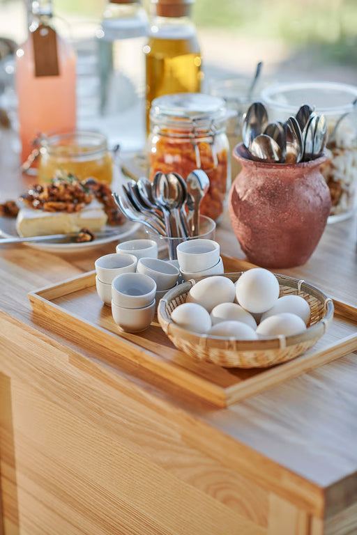 IKEA OSTBIT bamboo tray styled with white ceramics glass jars and utensil holder breakfast setting