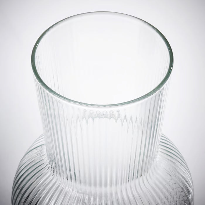 IKEA PÅDRAG clear glass vase side profile showing full height and elegant curved silhouette