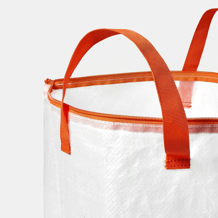 Close-up of IKEA PÄRKLA white mesh bag showing thick orange straps and zipper
