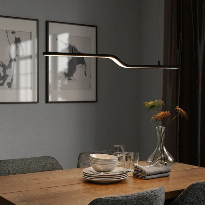  PILSKOTT pendant lamp with TRÅDFRI Wireless dimmer for customizable brightness.