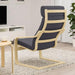 Comfortable POÄNG armchair, sleek design.
