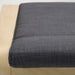 Close-up of IKEA POÄNG Skiftebo dark grey cushion showing textured fabric detailing