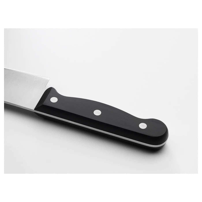 Knife with a black handle on a white background