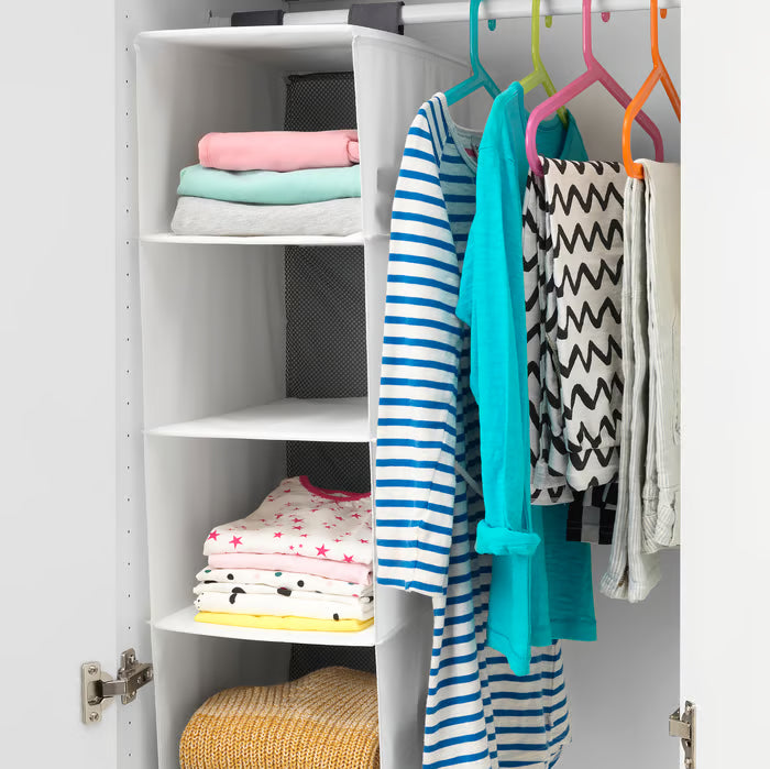 IKEA RASSLA white hanging storage with 5 compartments showing folded configuration on clothes rail