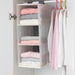  IKEA RASSLA white hanging organiser in wardrobe with clothes and accessories sorted in compartments