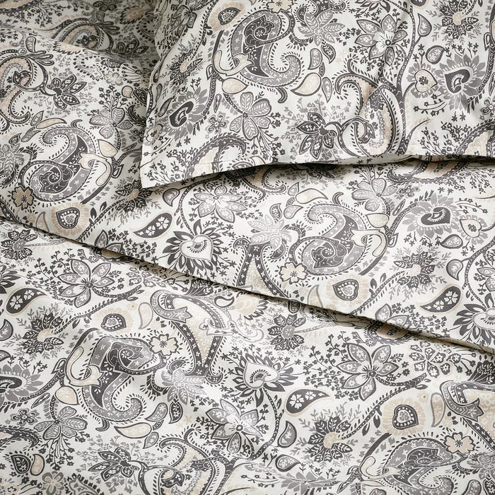 Close-up of IKEA RODGERSIA grey white paisley pattern on cotton-viscose fabric