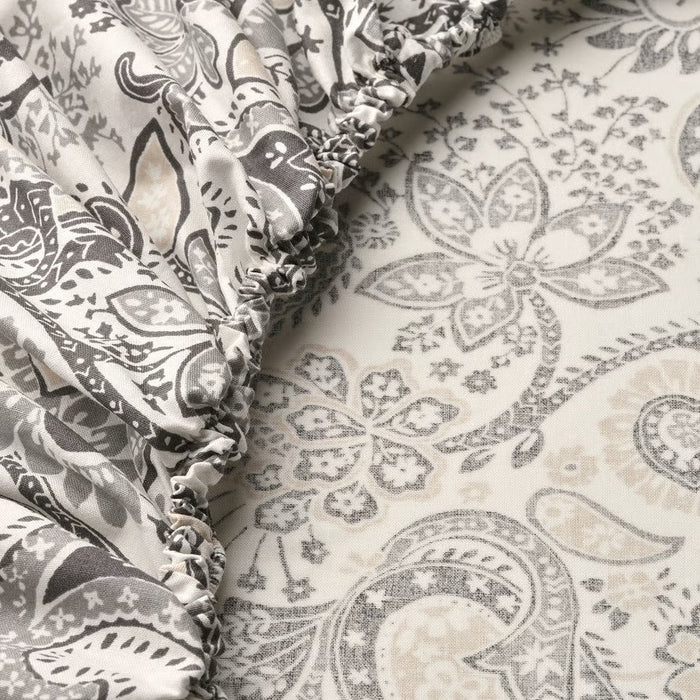 Scandinavian-style IKEA RODGERSIA fitted sheet (180x200 cm) in grey & white, item 105.795.14. Features durable cotton blend fabric and full elastic edges for easy bedding changes