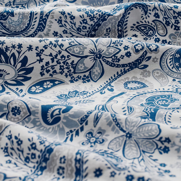 IKEA RODGERSIA blue white paisley fabric drape showing soft folds and breathable cotton-viscose texture