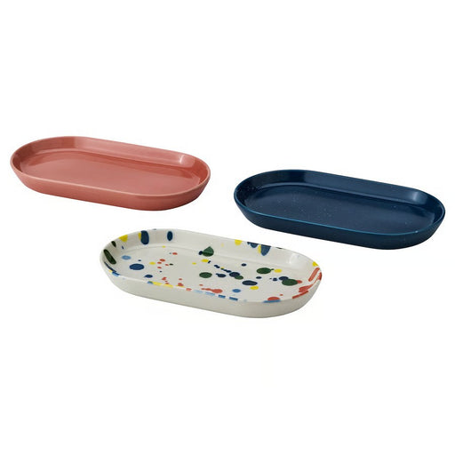 "IKEA RÖDSNULTRA serving plates in mixed patterns: pink, blue, and a splattered white design.60604506