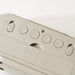 Close-up of a beige electronic device with buttons and the IKEA logo on a white background